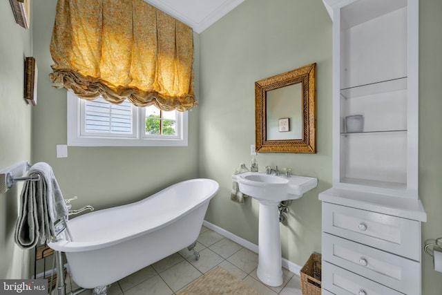 107 Swedes St, Dewey Beach, DE 19971 - full bathroom featuring a soaking tub, crown molding, and tile patterned flooring