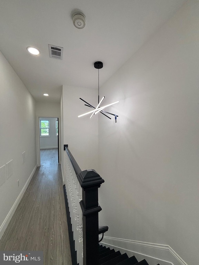 1748 N Chester St, Baltimore, MD 21213 - hallway featuring baseboards, recessed lighting, wood finished floors, and an upstairs landing