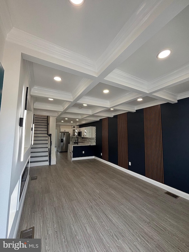 1748 N Chester St, Baltimore, MD 21213 - unfurnished living room featuring coffered ceiling, beam ceiling, stairs, dark wood-type flooring, and recessed lighting