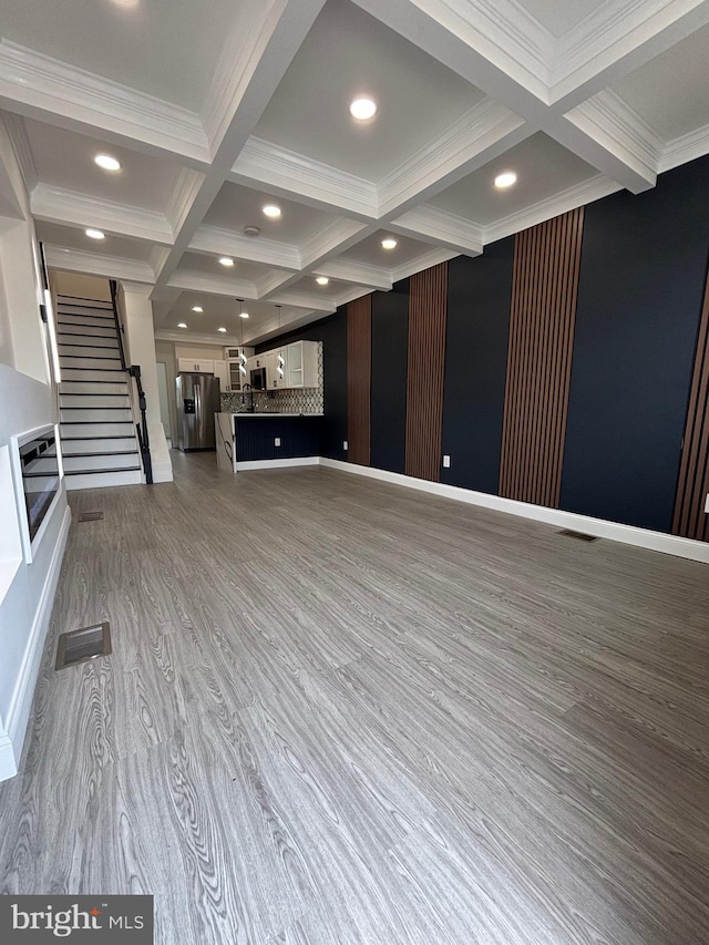 1748 N Chester St, Baltimore, MD 21213 - unfurnished living room with coffered ceiling, recessed lighting, beamed ceiling, wood finished floors, and ornamental molding