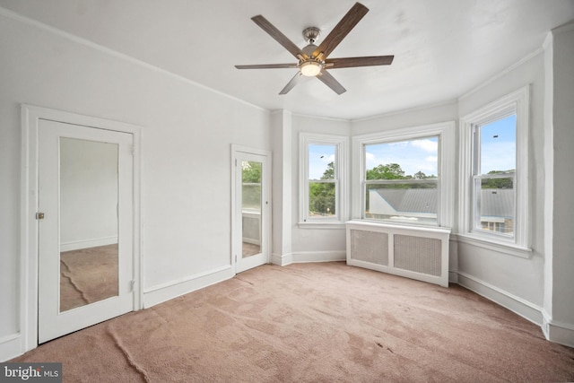 267 S 63rd St, Philadelphia, PA 19139 - unfurnished sunroom with radiator and healthy amount of natural light