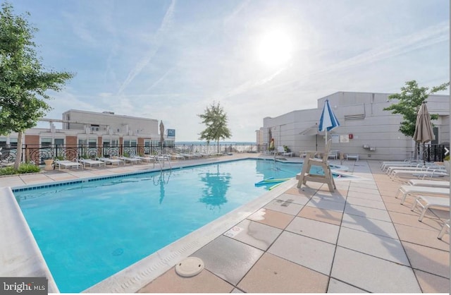 155 Potomac Psge Unit 429, Oxon Hill, MD 20745 - community pool featuring a patio