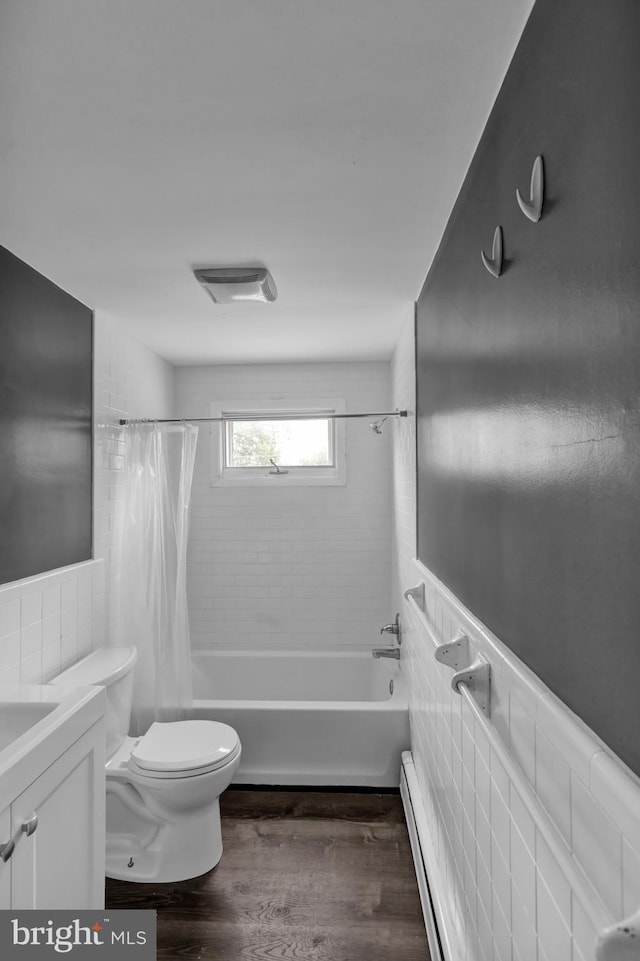1401 Rockland St, Reading, PA 19604 - bathroom featuring shower / tub combo, vanity, toilet, wood finished floors, and a baseboard heating unit