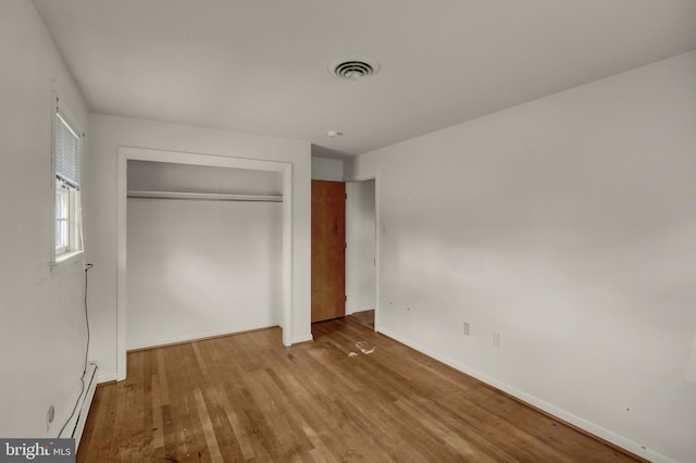 1401 Rockland St, Reading, PA 19604 - unfurnished bedroom with a closet, wood finished floors, and baseboards