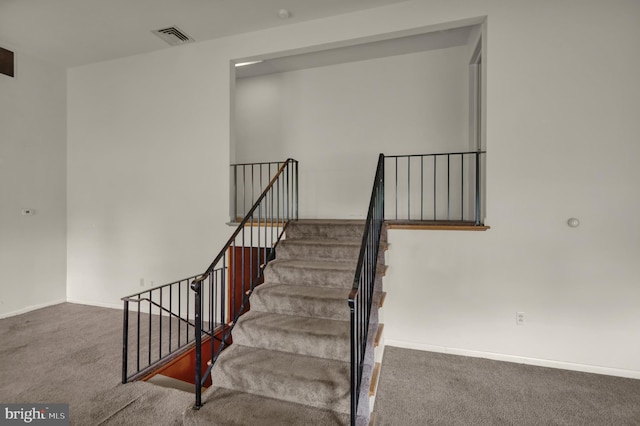 1401 Rockland St, Reading, PA 19604 - stairs featuring carpet floors and baseboards