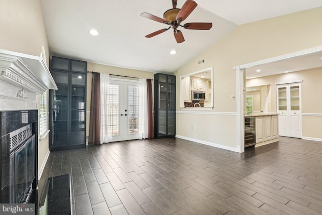 5 Locust Ln, Newtown, PA 18940 - unfurnished living room featuring french doors, lofted ceiling, a fireplace, baseboards, and recessed lighting