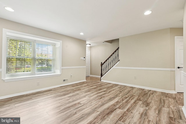 5 Locust Ln, Newtown, PA 18940 - spare room featuring wood finished floors, stairs, baseboards, and recessed lighting