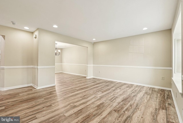 5 Locust Ln, Newtown, PA 18940 - empty room featuring wood finished floors, recessed lighting, baseboards, and a chandelier