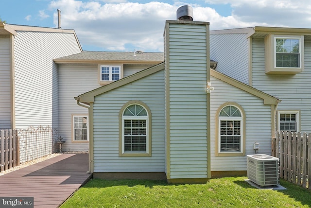 5 Locust Ln, Newtown, PA 18940 - rear view of property with central AC, a wooden deck, and a chimney