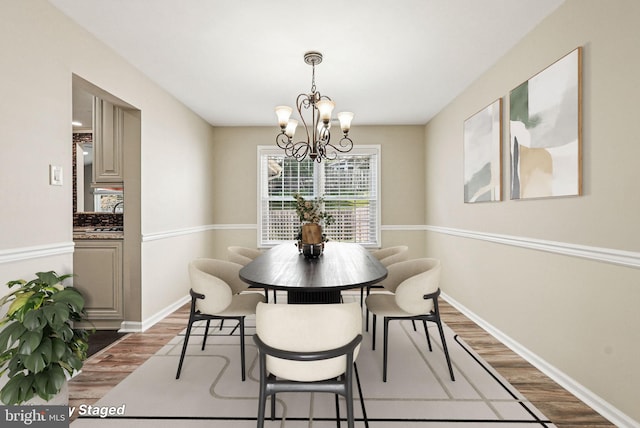 5 Locust Ln, Newtown, PA 18940 - dining space featuring light wood-style floors, a chandelier, and baseboards