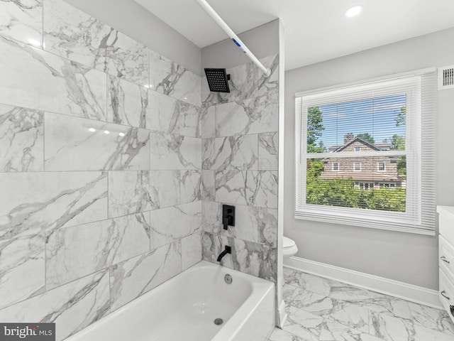 285 N Lansdowne Ave, Lansdowne, PA 19050 - bathroom with shower / bath combination, toilet, vanity, baseboards, and marble look tiles