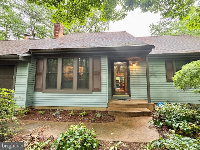 8 Vale Dr, Tabernacle Twp, NJ 08088 - view of exterior entry featuring a chimney