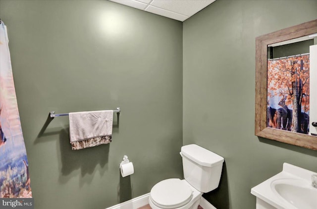 35 Krall Rd, Myerstown, PA 17067 - bathroom featuring toilet, baseboards, a drop ceiling, and vanity