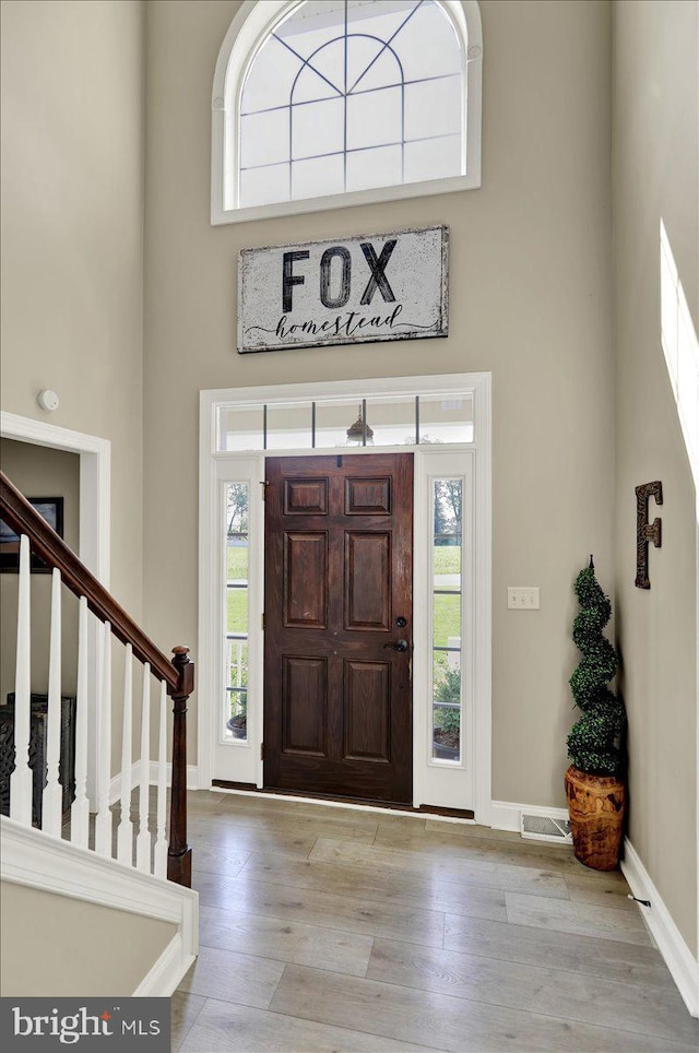 35 Krall Rd, Myerstown, PA 17067 - entrance foyer featuring a high ceiling, wood finished floors, stairs, and baseboards