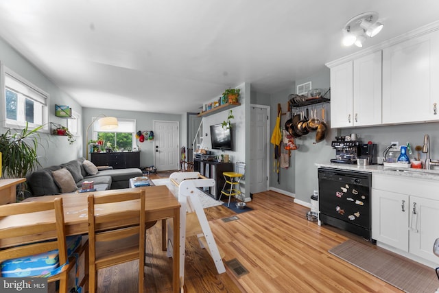 6807 Radcliffe Dr, Alexandria, VA 22307 - dining area featuring light wood-type flooring and baseboards