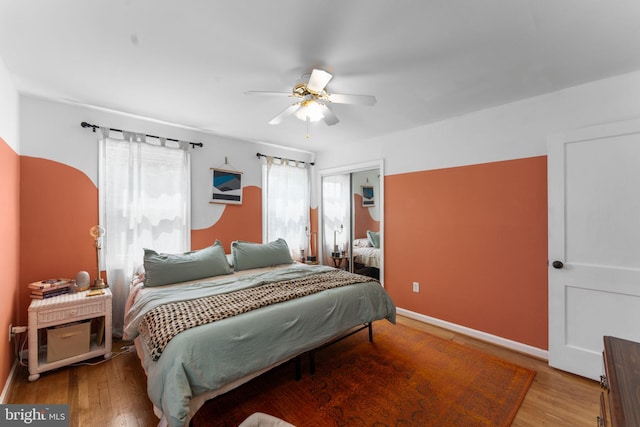 6807 Radcliffe Dr, Alexandria, VA 22307 - bedroom featuring a closet, wood finished floors, and baseboards