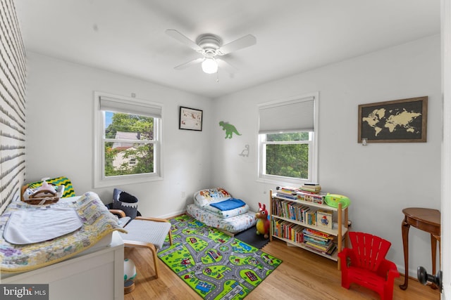6807 Radcliffe Dr, Alexandria, VA 22307 - rec room featuring wood finished floors, a ceiling fan, and baseboards