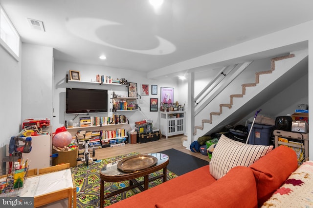 6807 Radcliffe Dr, Alexandria, VA 22307 - living area with stairs, wood finished floors, and recessed lighting