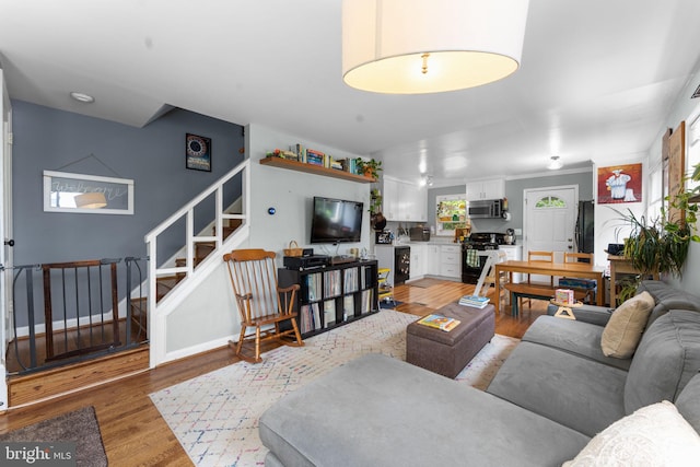 6807 Radcliffe Dr, Alexandria, VA 22307 - living area with stairway and light wood-type flooring
