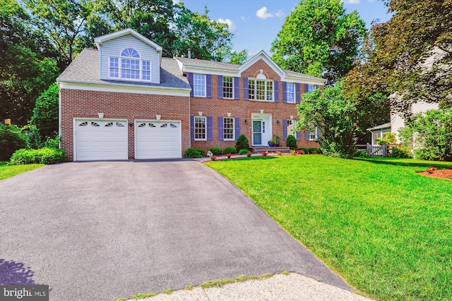 19802 Shady Brook Way, Gaithersburg, MD 20879 - colonial house featuring driveway, a front lawn, and brick siding