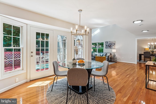 19802 Shady Brook Way, Gaithersburg, MD 20879 - dining area featuring a chandelier and light wood finished floors