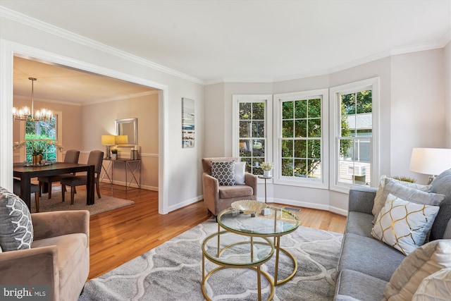 19802 Shady Brook Way, Gaithersburg, MD 20879 - living area with a chandelier, wood finished floors, and ornamental molding