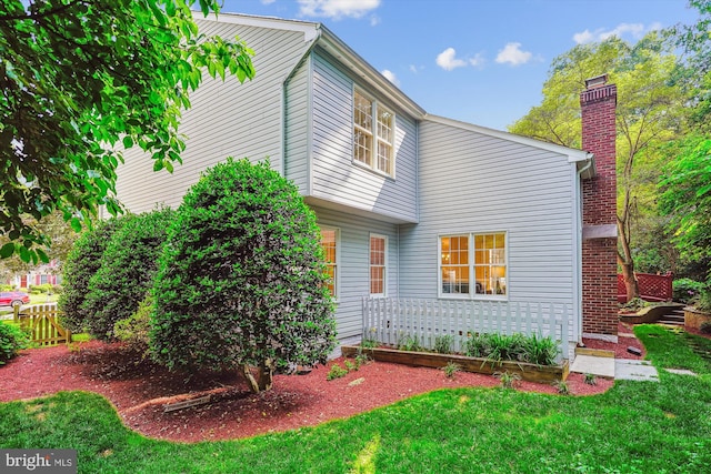 19802 Shady Brook Way, Gaithersburg, MD 20879 - view of property exterior with a chimney