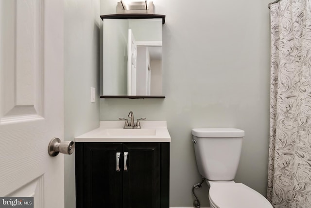 1324 Hazel Nut Ct, Annapolis, MD 21409 - bathroom with toilet, vanity, and a shower with curtain