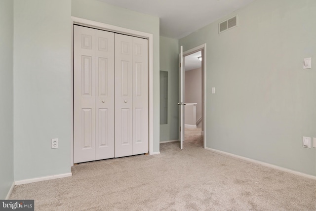 1324 Hazel Nut Ct, Annapolis, MD 21409 - unfurnished bedroom featuring carpet flooring, a closet, and baseboards