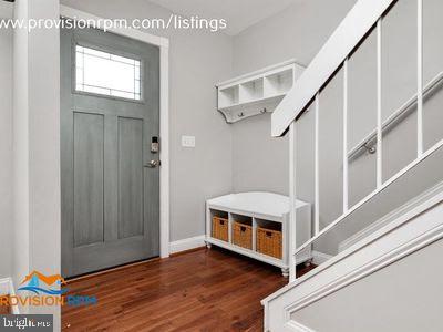 1324 Hazel Nut Ct, Annapolis, MD 21409 - mudroom featuring wood finished floors and baseboards