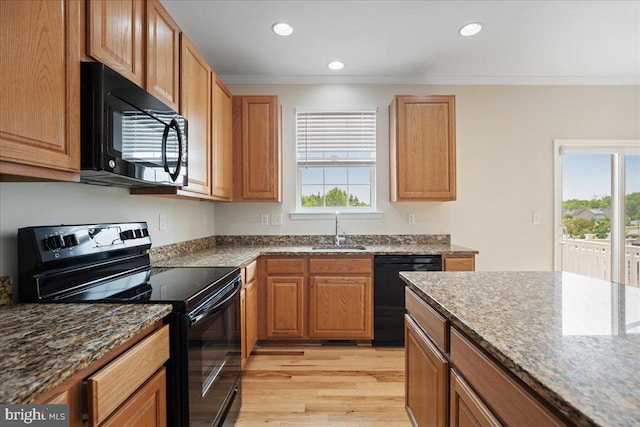 126 Backstretch Way, Prince Frederick, MD 20678 - kitchen with black appliances, crown molding, a sink, light wood finished floors, and recessed lighting