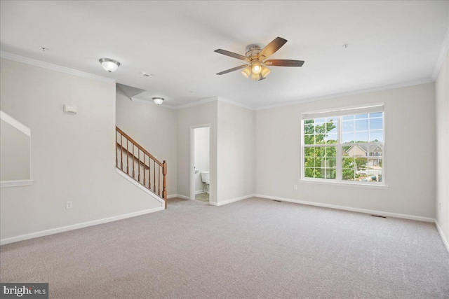 126 Backstretch Way, Prince Frederick, MD 20678 - carpeted spare room featuring a ceiling fan, crown molding, stairs, and baseboards