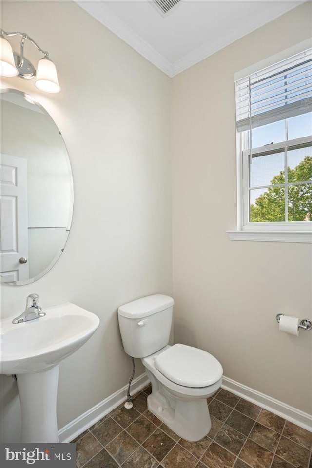 126 Backstretch Way, Prince Frederick, MD 20678 - bathroom featuring toilet, baseboards, and crown molding