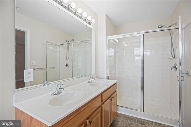126 Backstretch Way, Prince Frederick, MD 20678 - full bathroom featuring double vanity and a shower stall