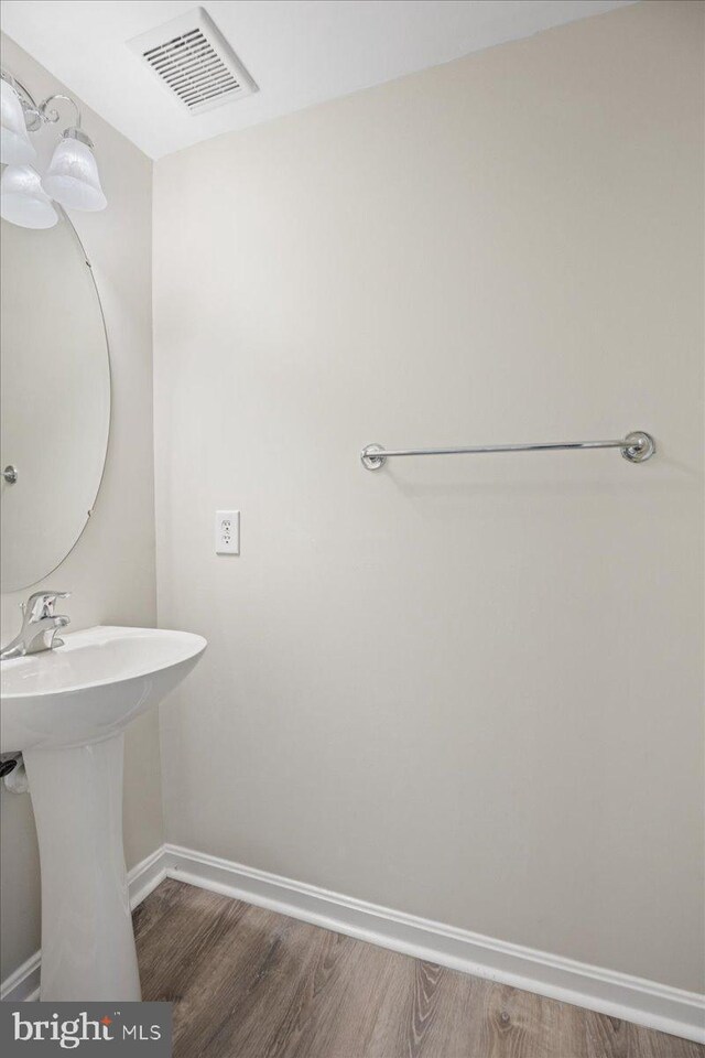 126 Backstretch Way, Prince Frederick, MD 20678 - bathroom with wood finished floors and baseboards