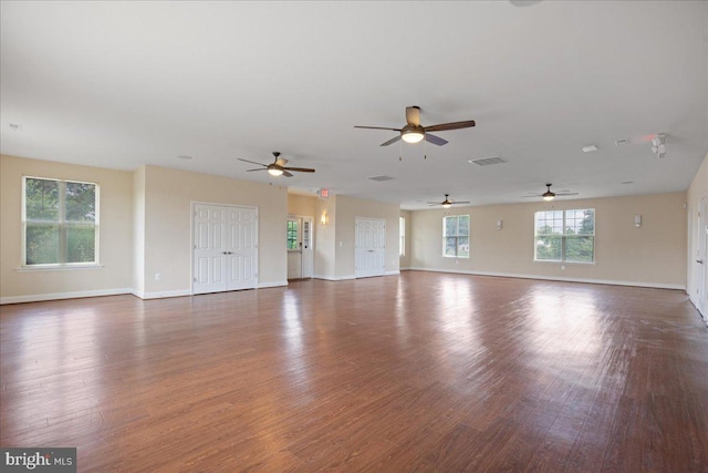 126 Backstretch Way, Prince Frederick, MD 20678 - unfurnished living room featuring wood finished floors, baseboards, and a ceiling fan
