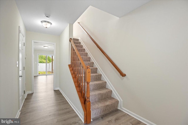 126 Backstretch Way, Prince Frederick, MD 20678 - staircase with wood finished floors and baseboards