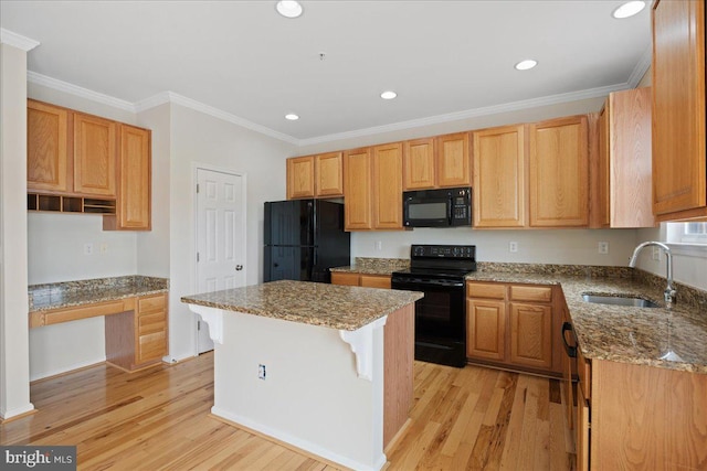 126 Backstretch Way, Prince Frederick, MD 20678 - kitchen featuring black appliances, a sink, light wood-style flooring, light stone counters, and recessed lighting
