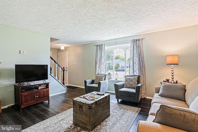 6786 Singletree Ct, Frederick, MD 21703 - living area with stairway, wood finished floors, baseboards, and a textured ceiling