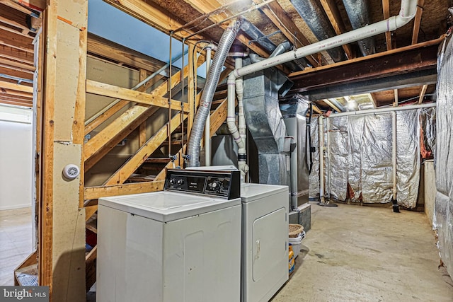 6786 Singletree Ct, Frederick, MD 21703 - laundry area with washer and clothes dryer