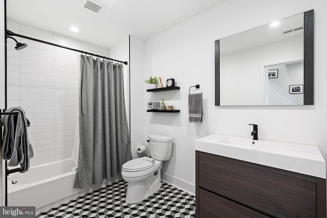 2206 E Fletcher St, Philadelphia, PA 19125 - bathroom featuring vanity, toilet, shower / tub combo with curtain, baseboards, and tile patterned floors