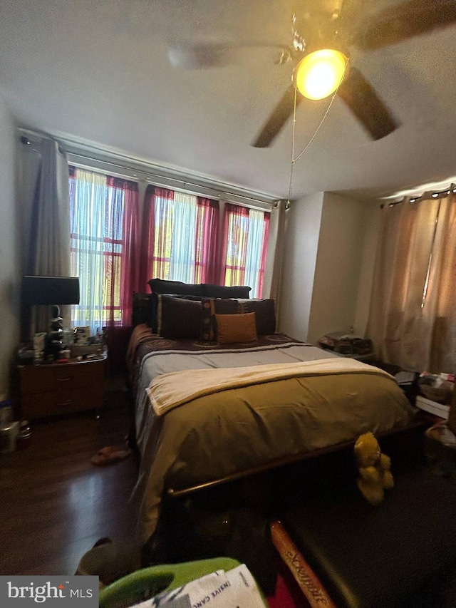 1621 N 33rd St, Philadelphia, PA 19121 - bedroom featuring multiple windows, ceiling fan, and wood finished floors