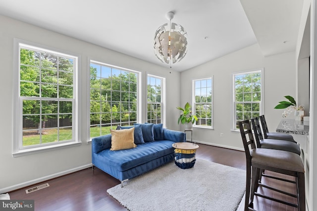 12916 Steam Mill Farm Dr, Brandywine, MD 20613 - living area featuring baseboards, wood finished floors, and vaulted ceiling