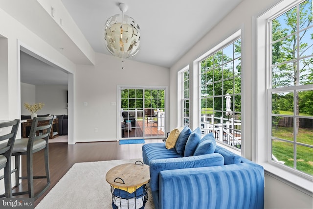 12916 Steam Mill Farm Dr, Brandywine, MD 20613 - living room with plenty of natural light, lofted ceiling, wood finished floors, and baseboards