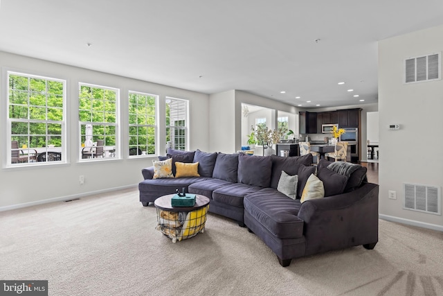 12916 Steam Mill Farm Dr, Brandywine, MD 20613 - living area featuring baseboards, healthy amount of natural light, light carpet, and recessed lighting