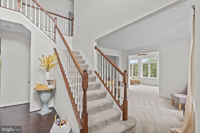 12916 Steam Mill Farm Dr, Brandywine, MD 20613 - stairs featuring crown molding, baseboards, and wood finished floors