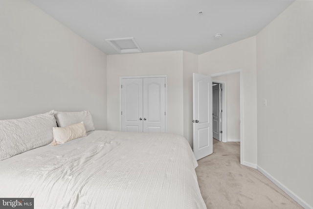 12916 Steam Mill Farm Dr, Brandywine, MD 20613 - bedroom with light colored carpet, attic access, baseboards, and a closet