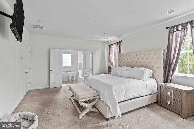 12916 Steam Mill Farm Dr, Brandywine, MD 20613 - bedroom with multiple windows, light carpet, radiator heating unit, and baseboards