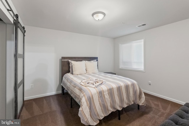 12916 Steam Mill Farm Dr, Brandywine, MD 20613 - bedroom with carpet flooring, baseboards, and a barn door
