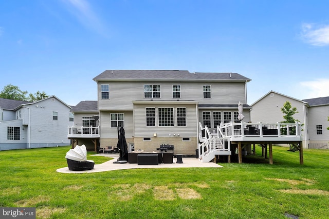 12916 Steam Mill Farm Dr, Brandywine, MD 20613 - back of house featuring a patio, a deck, stairway, and a lawn